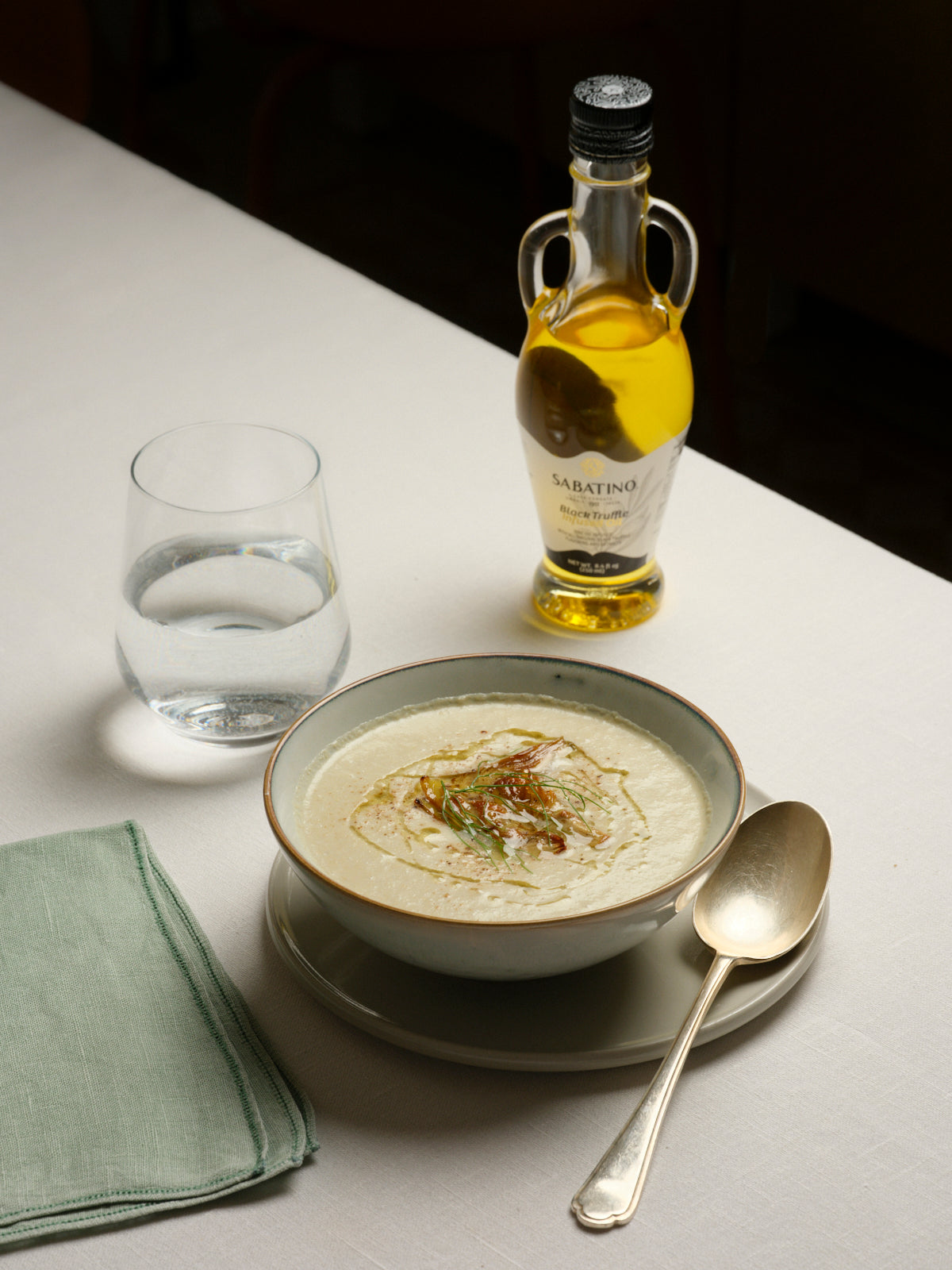 Creamy Artichoke Soup with Black Truffle Infused Oil