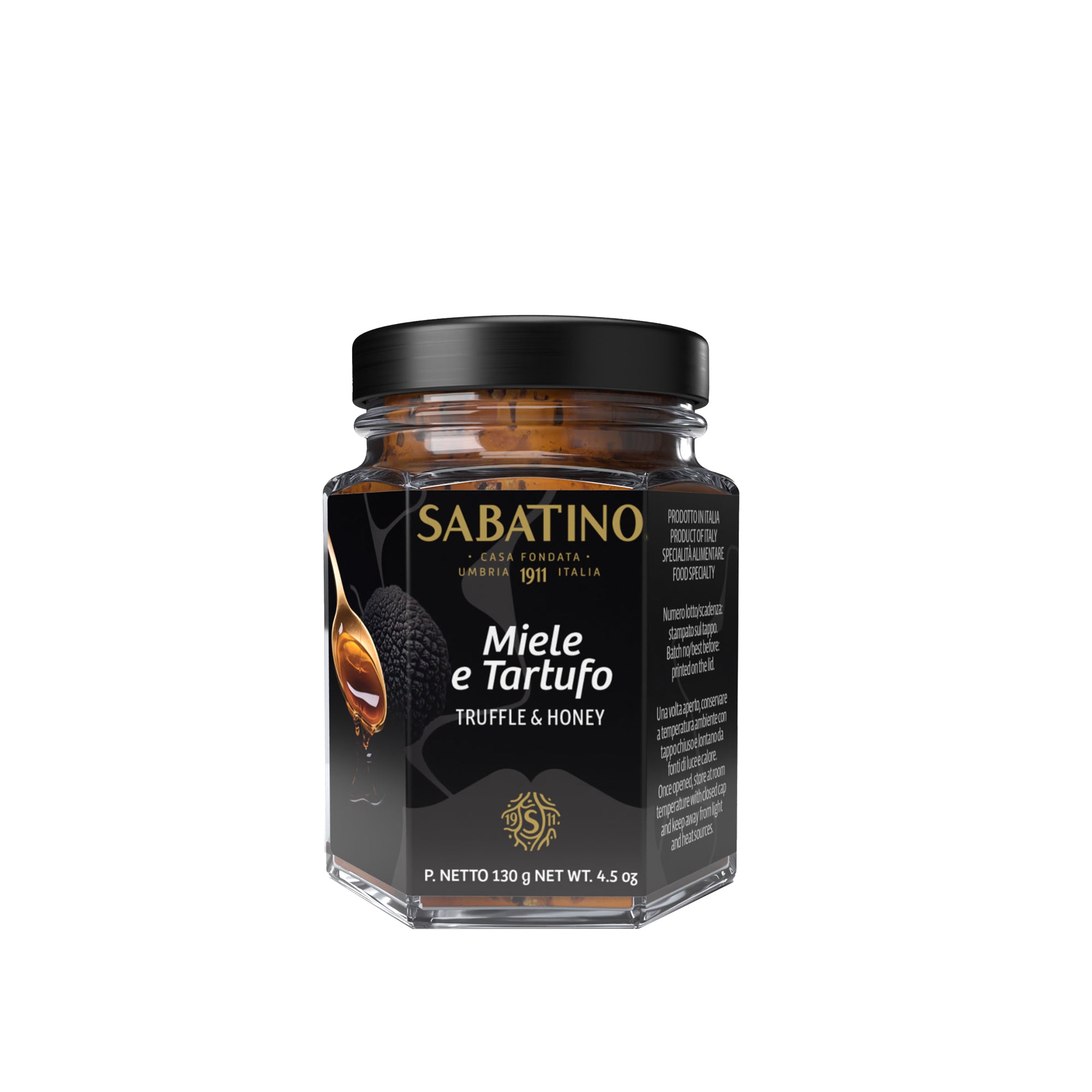 a jar of honey with a black lid