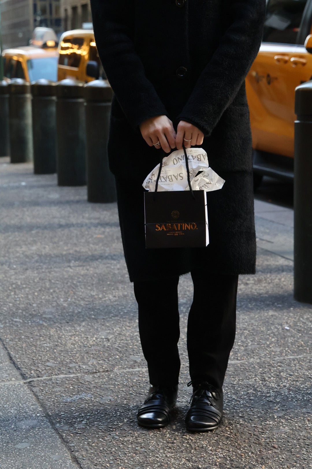 a person holding a bag