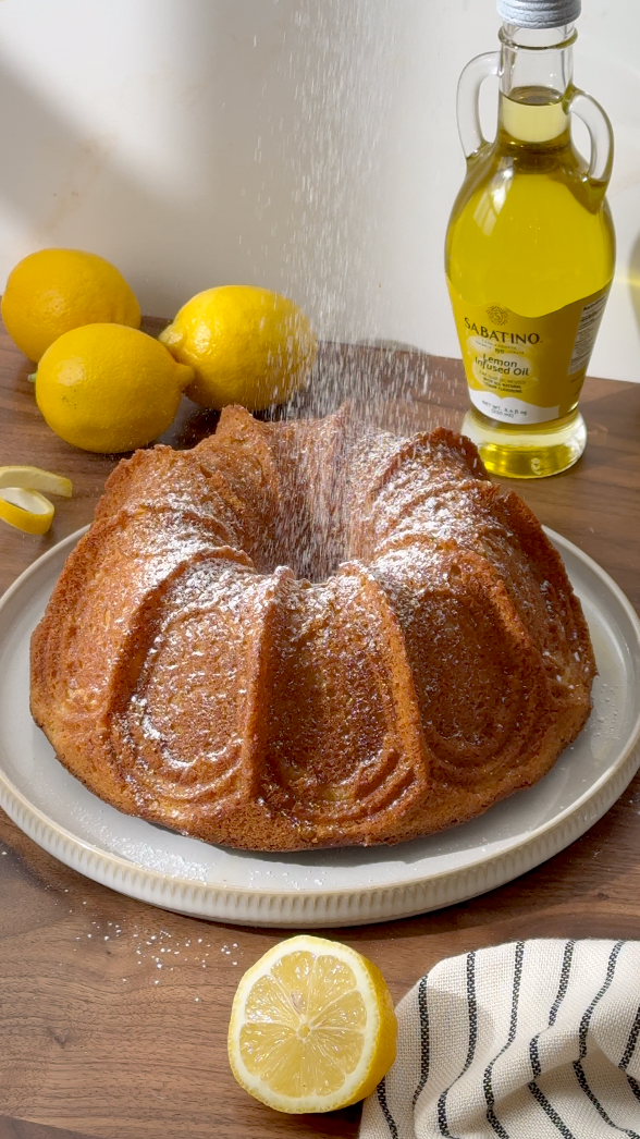 a bundt cake sprinkled with powdered sugar