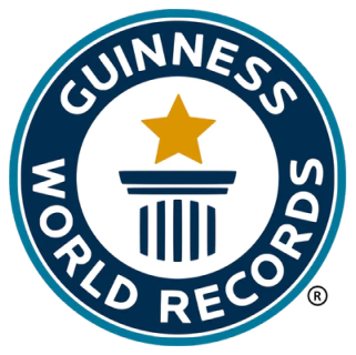 a blue and white logo with a star and a column
