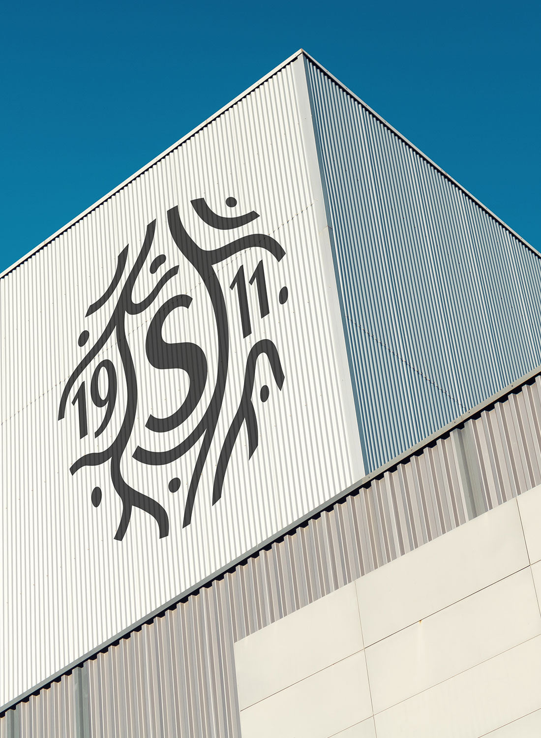 a white building with a logo on it