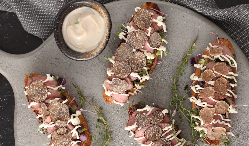Grilled Lamb Loin Crostini served with Truffle Aioli