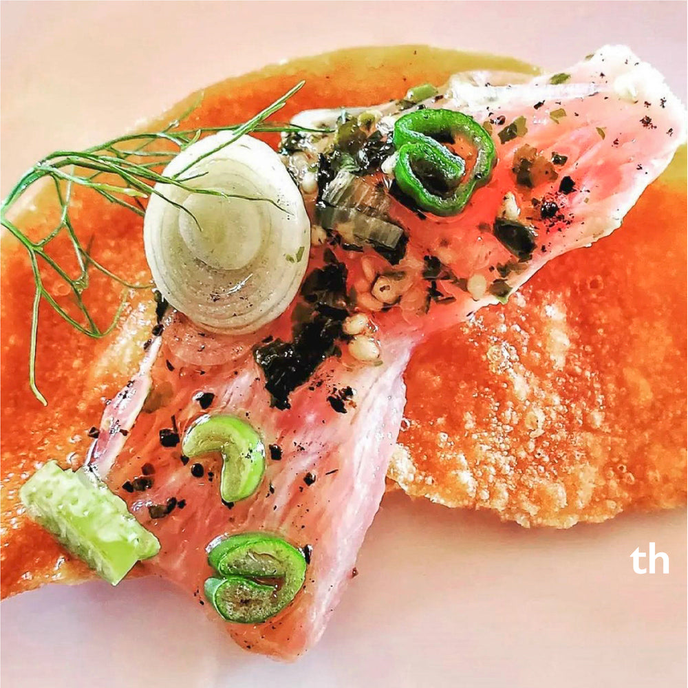 Hamachi Crudo with Charred Shishito Peppers & Shallot Truffle Vinaigrette