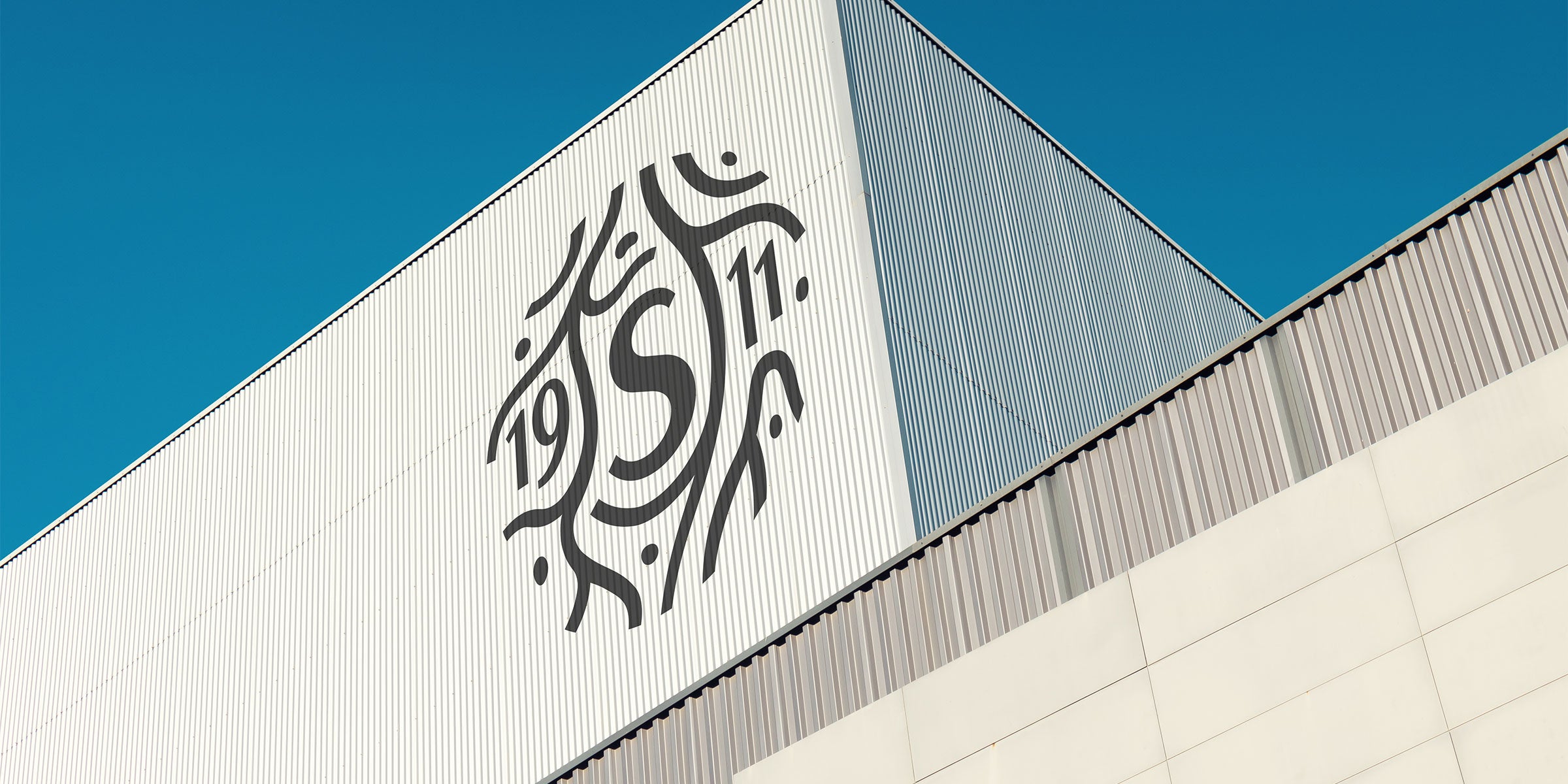 a white building with a logo on it