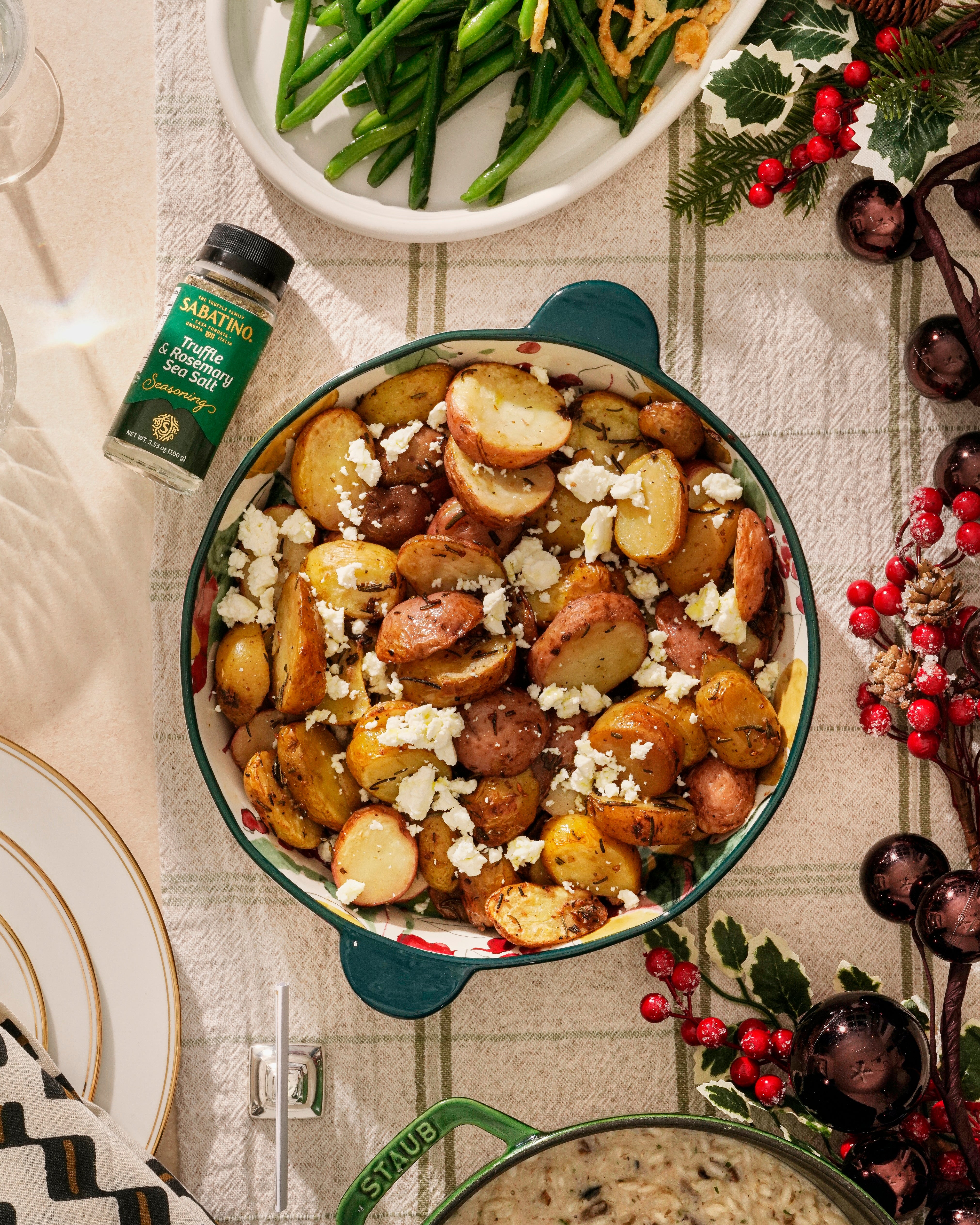 a bowl of potatoes and cheese